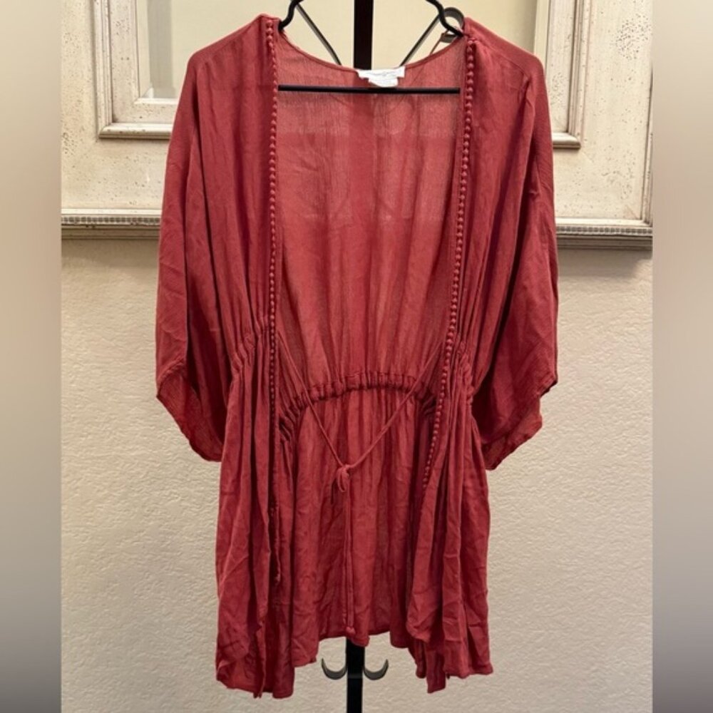 Float through your day in this Treasure & Bond boho tunic, crafted from airy vis